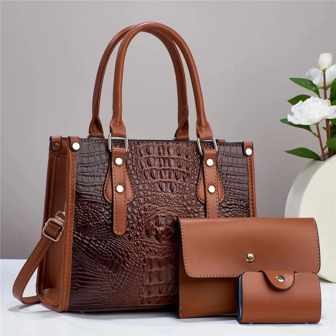 Contrast colour three-piece bag set showing bucket-shaped crossbody bag, wallet, and card holder in coordinated colours