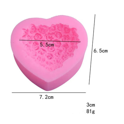 Pink silicone heart-shaped mould with a love design for Valentine's Day crafting.