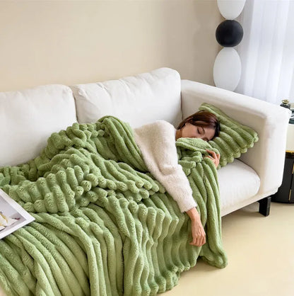 Double-sided bubble velvet faux rabbit fur blanket in a solid colour, shown folded.