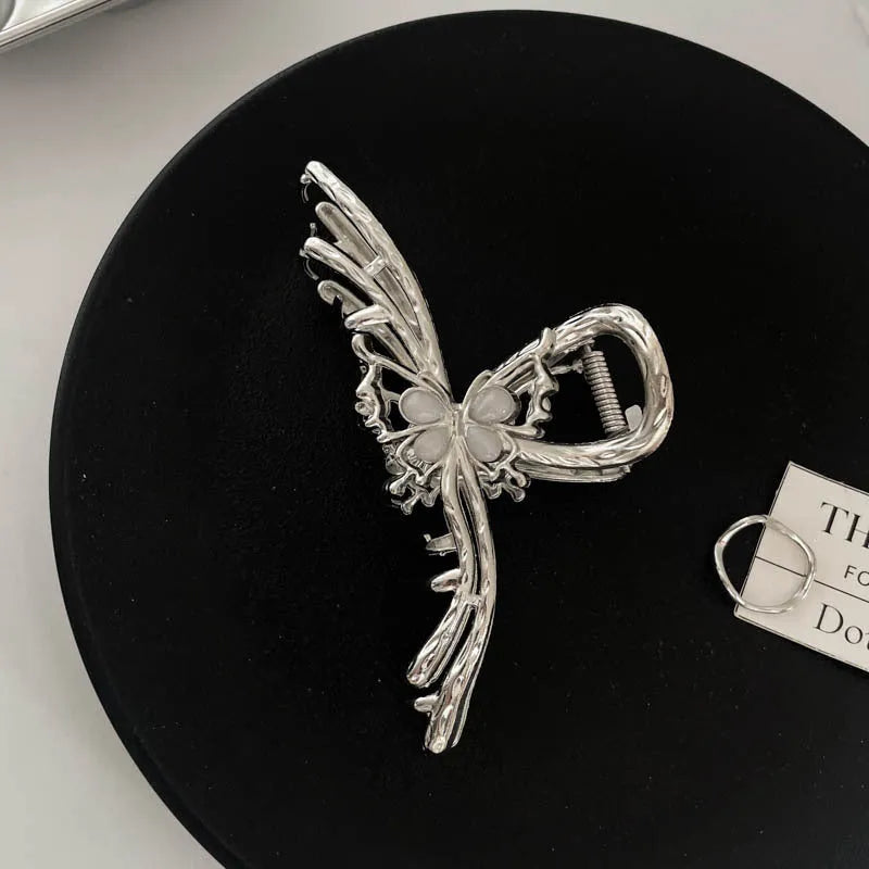 Silver metal hair claw barrette example from a range of 44 Korean-style designs.