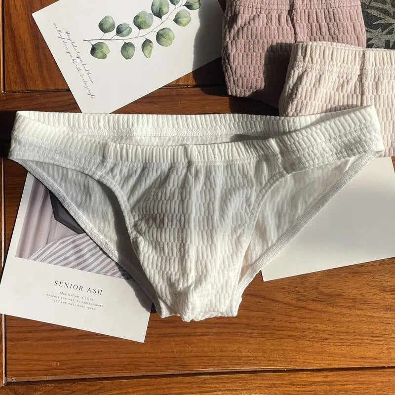 Men's solid colour pure cotton triangle underwear briefs on a mid-waist fit model