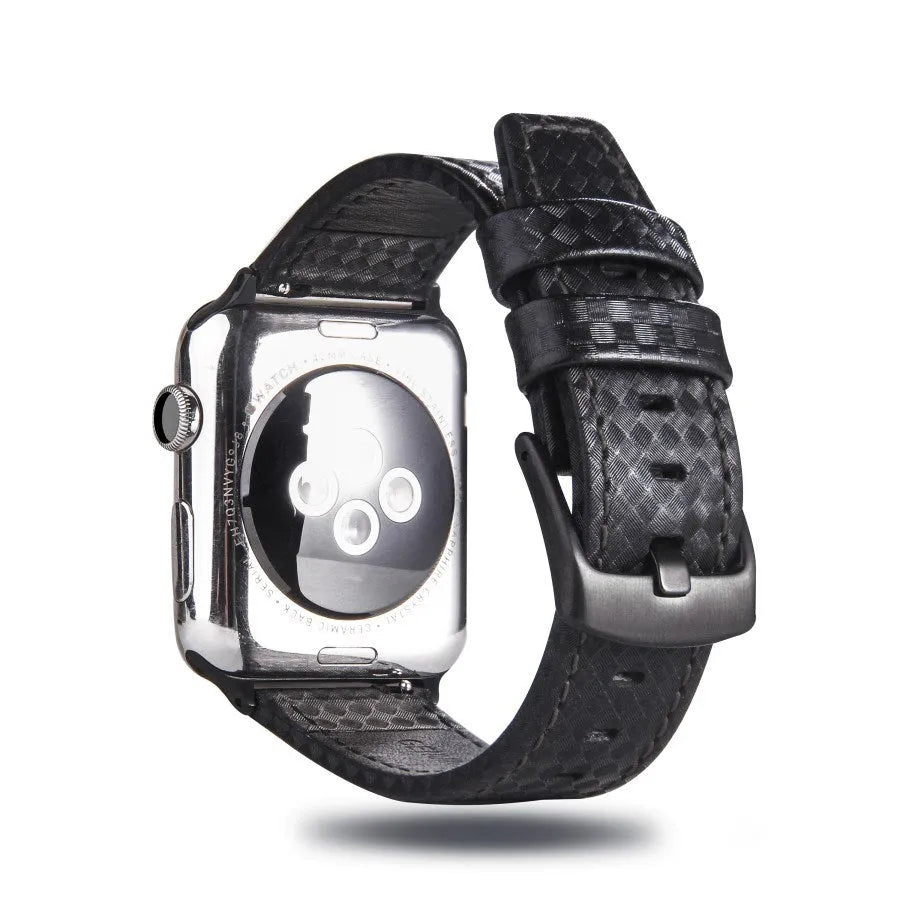 Leather Apple Watch strap with carbon fibre pattern case in red, black, orange, and blue colour options.