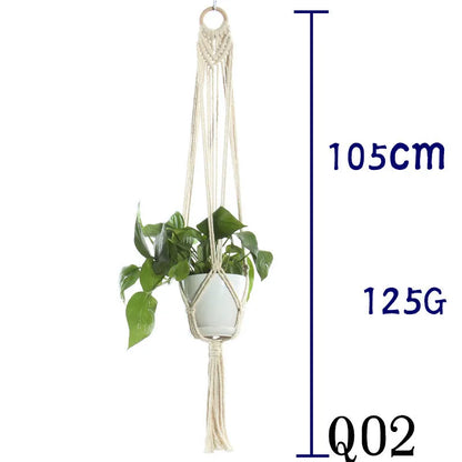Handmade beige cotton rope net bag holding a plant pot, showing its textured sling design.