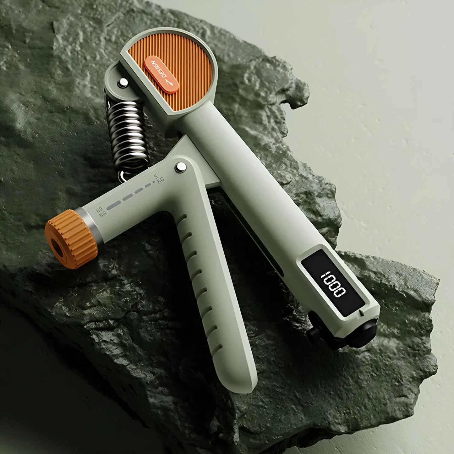 Adjustable count spring hand gripper in black, white, or green ABS plastic.
