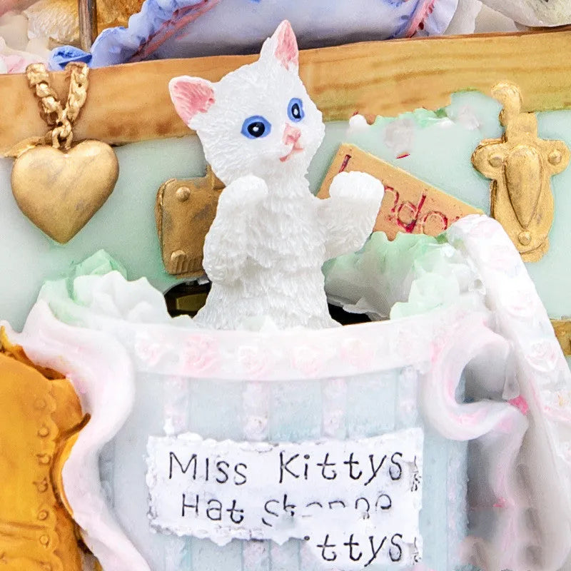 White cold porcelain music box with rotating snowflake and jewellery storage compartments