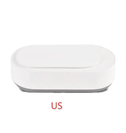 White portable ultrasonic cleaner with stainless steel tank for cleaning jewellery and glasses.