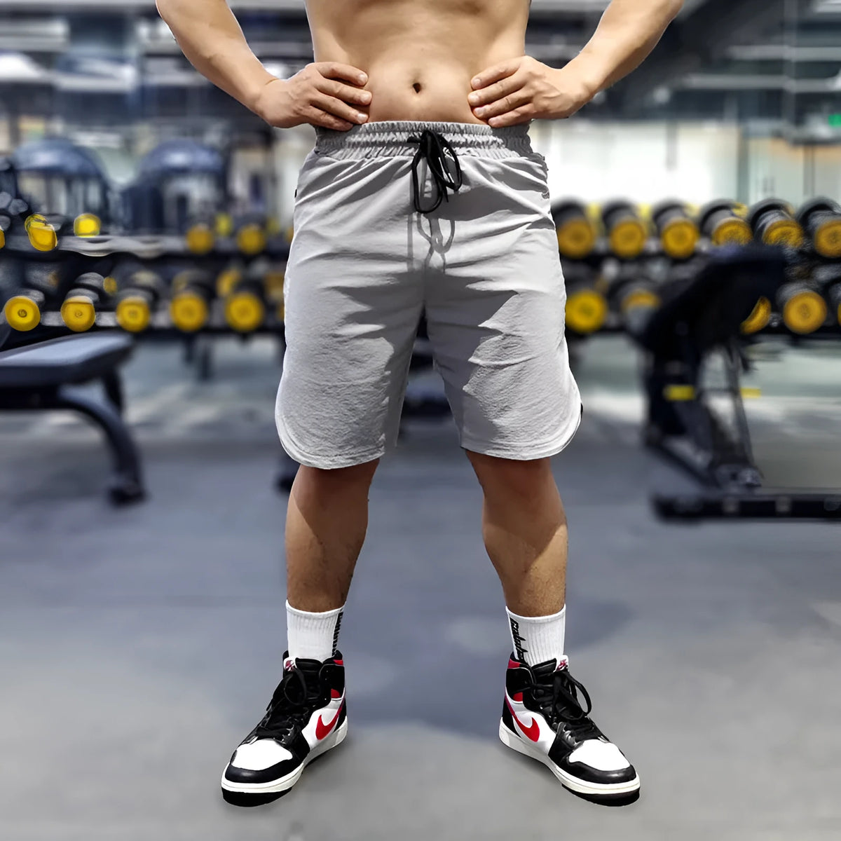 Men's quick-dry running shorts in polyamide-spandex blend fabric shown in black, blue and grey colour options