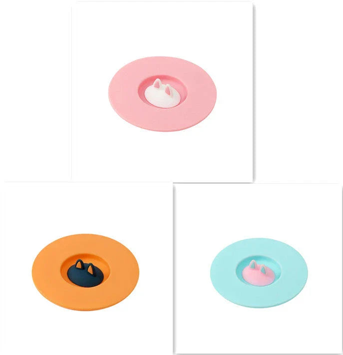 Charming cat ear silicone sealing lid in vibrant colours, designed to keep drinks fresh and prevent spills