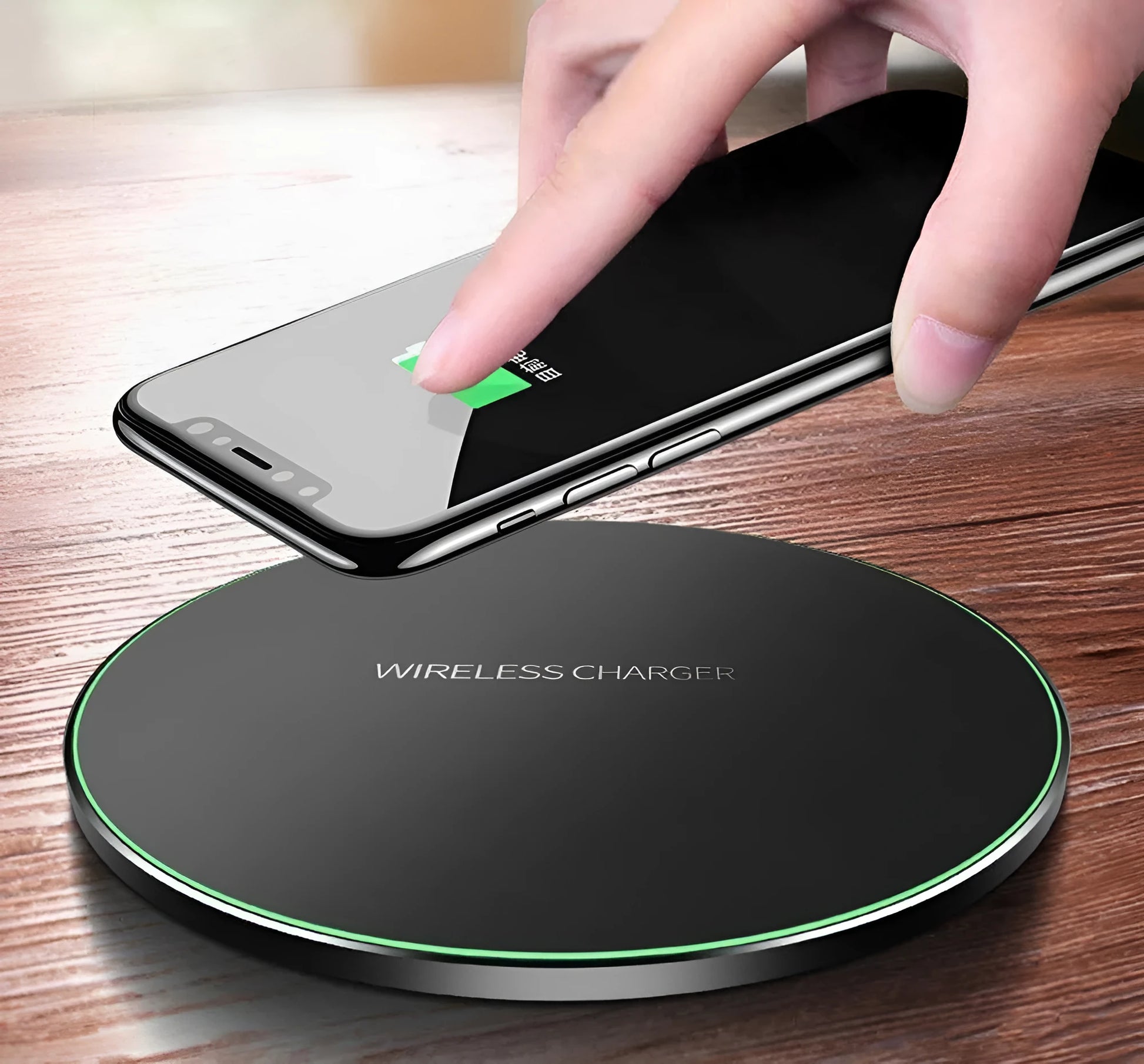 Black ultra-thin square wireless fast charging pad for phones on a desk