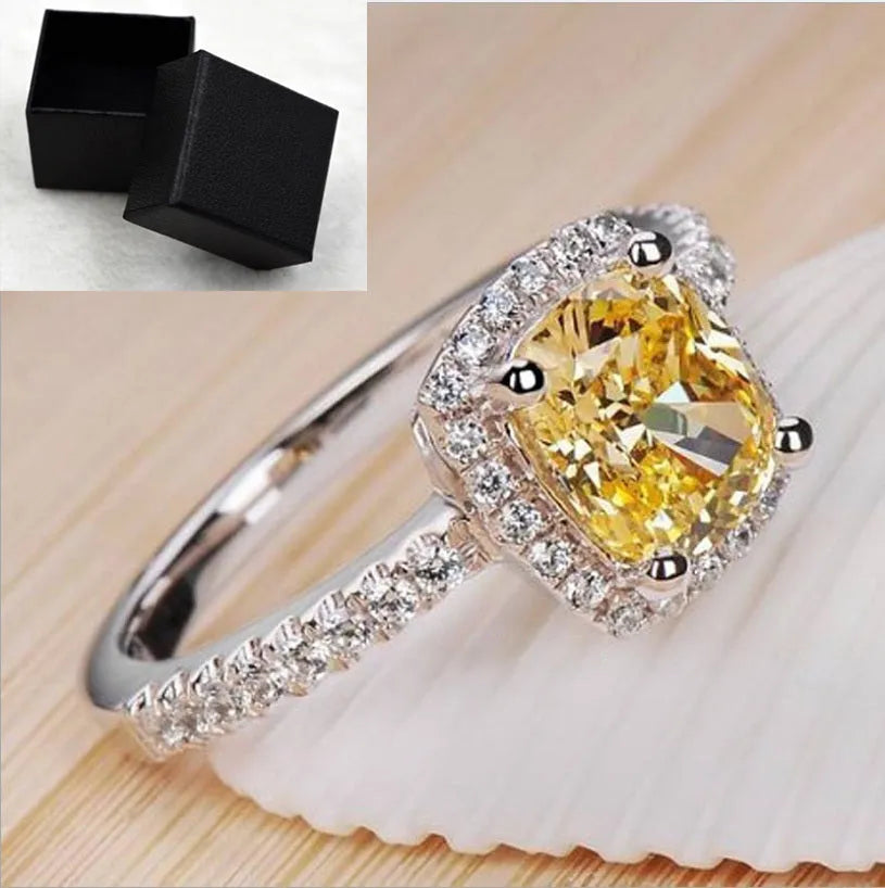 Women's silver colour alloy ring with artificial gemstone inlay and geometric design, bridal style.