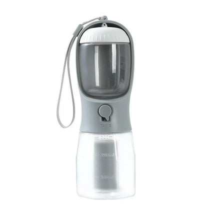 Portable 3-in-1 pet water bottle with built-in filtration system, food container, and waste bag storage compartment