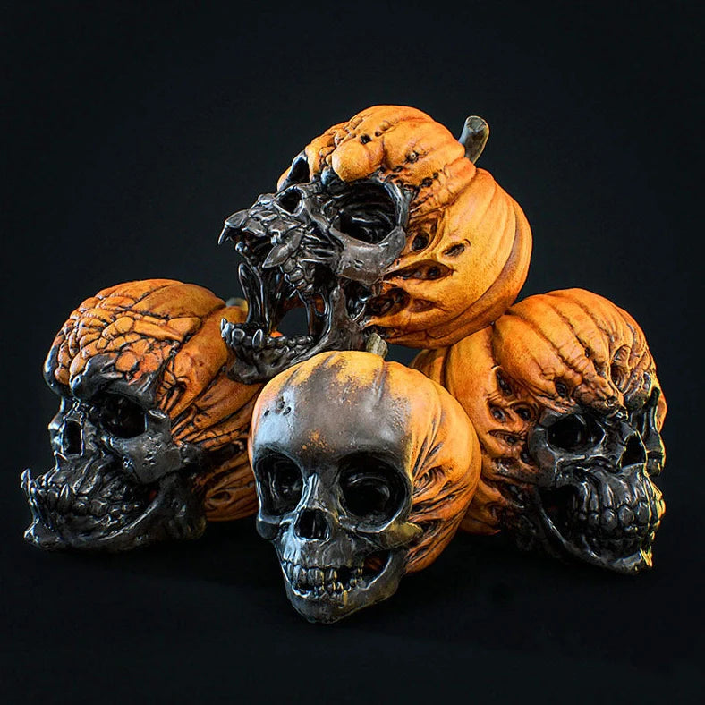 Hand-painted pumpkin skull resin ornament measuring 12cm tall with orange and black colour scheme