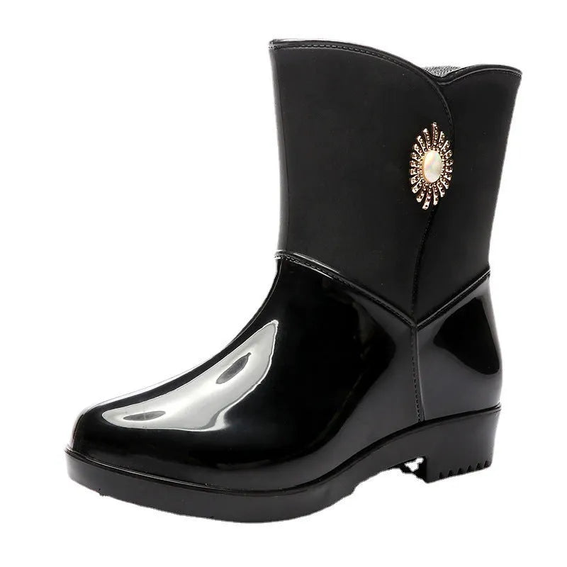 Women's mid-calf rain boots in beige, black, or purple with a non-slip sole.