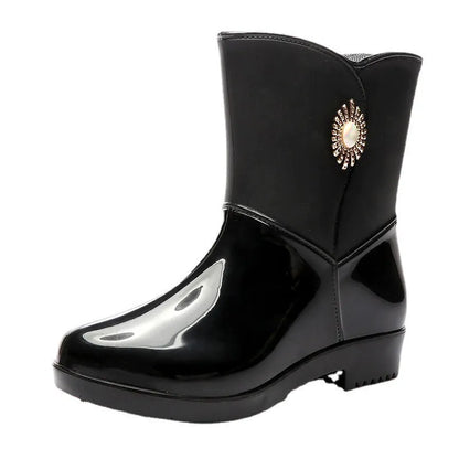 Women's mid-calf rain boots in beige, black, or purple with a non-slip sole.