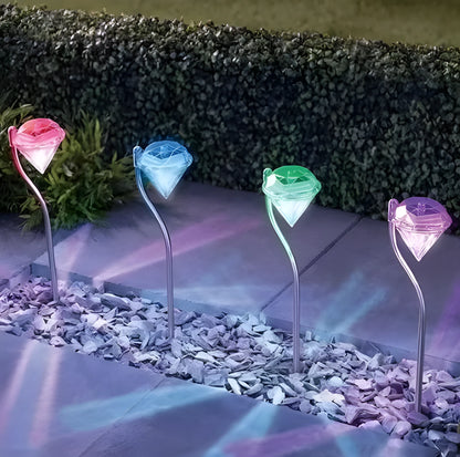 Solar-powered garden spotlight with adjustable angle and IP55 waterproof rating for outdoor lighting