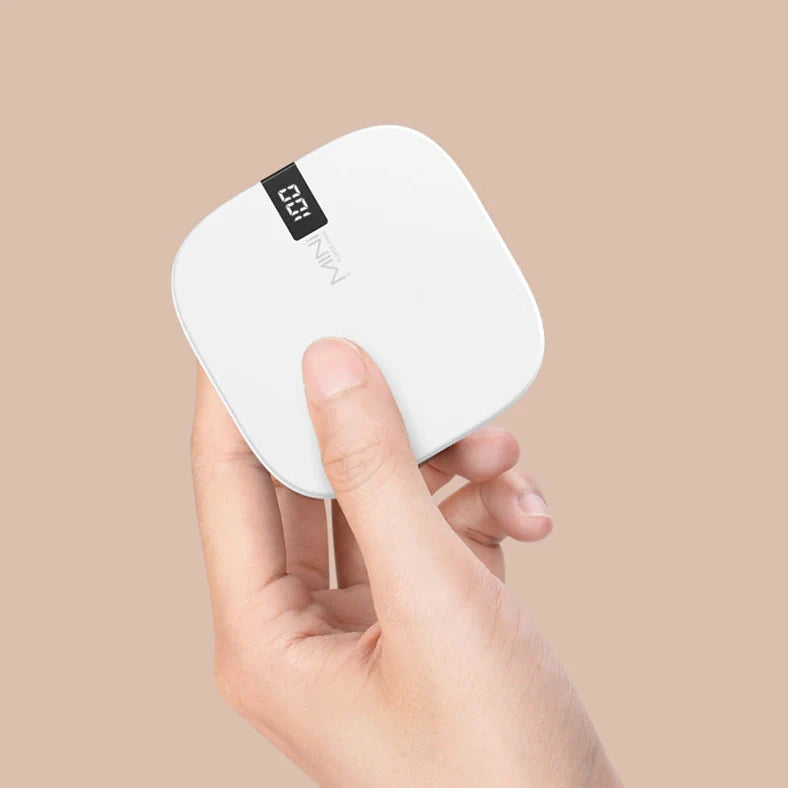 10000mAh mini power bank with digital display showing battery percentage