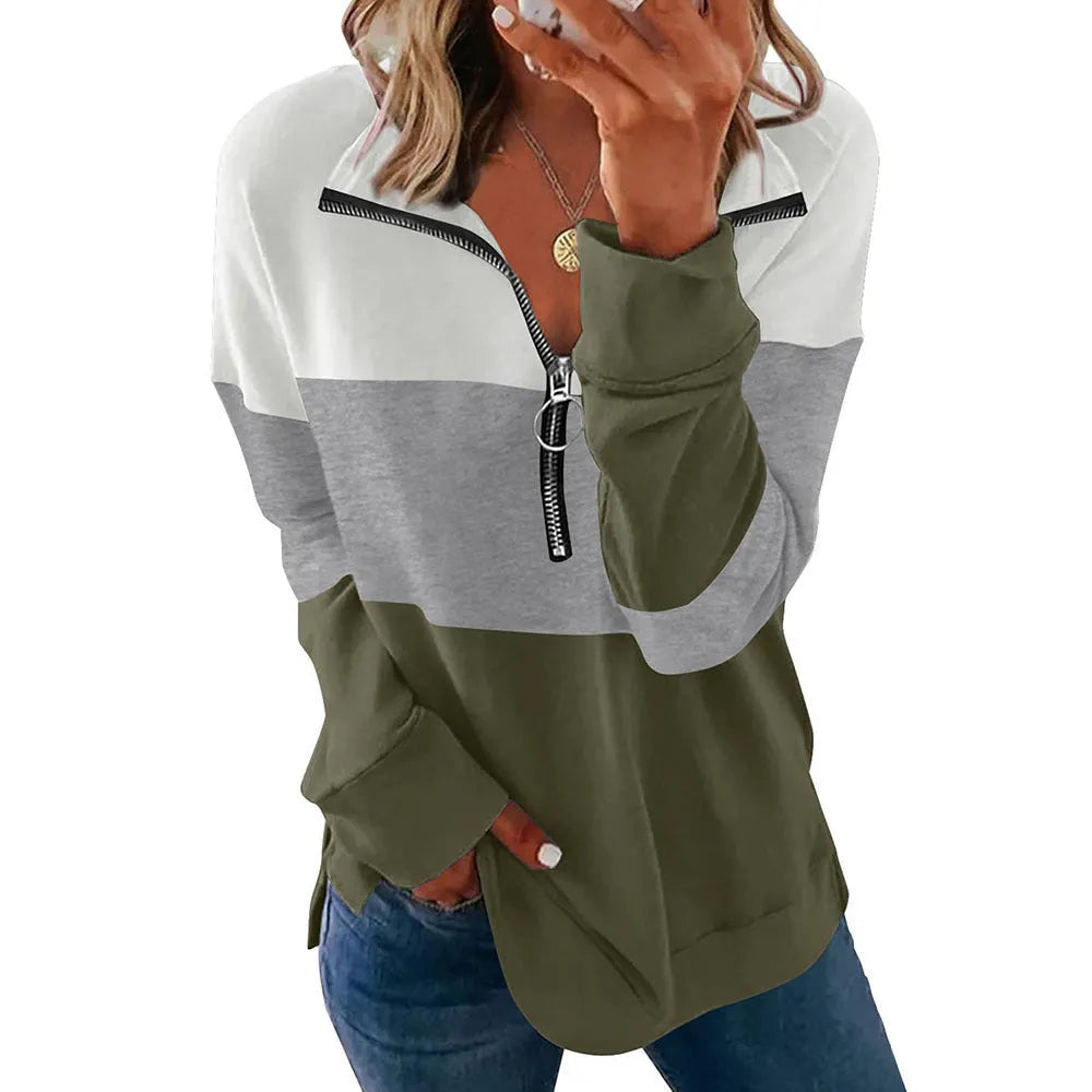 Women's loose long-sleeved leopard print pullover sweater on a hanger, showing colour options.