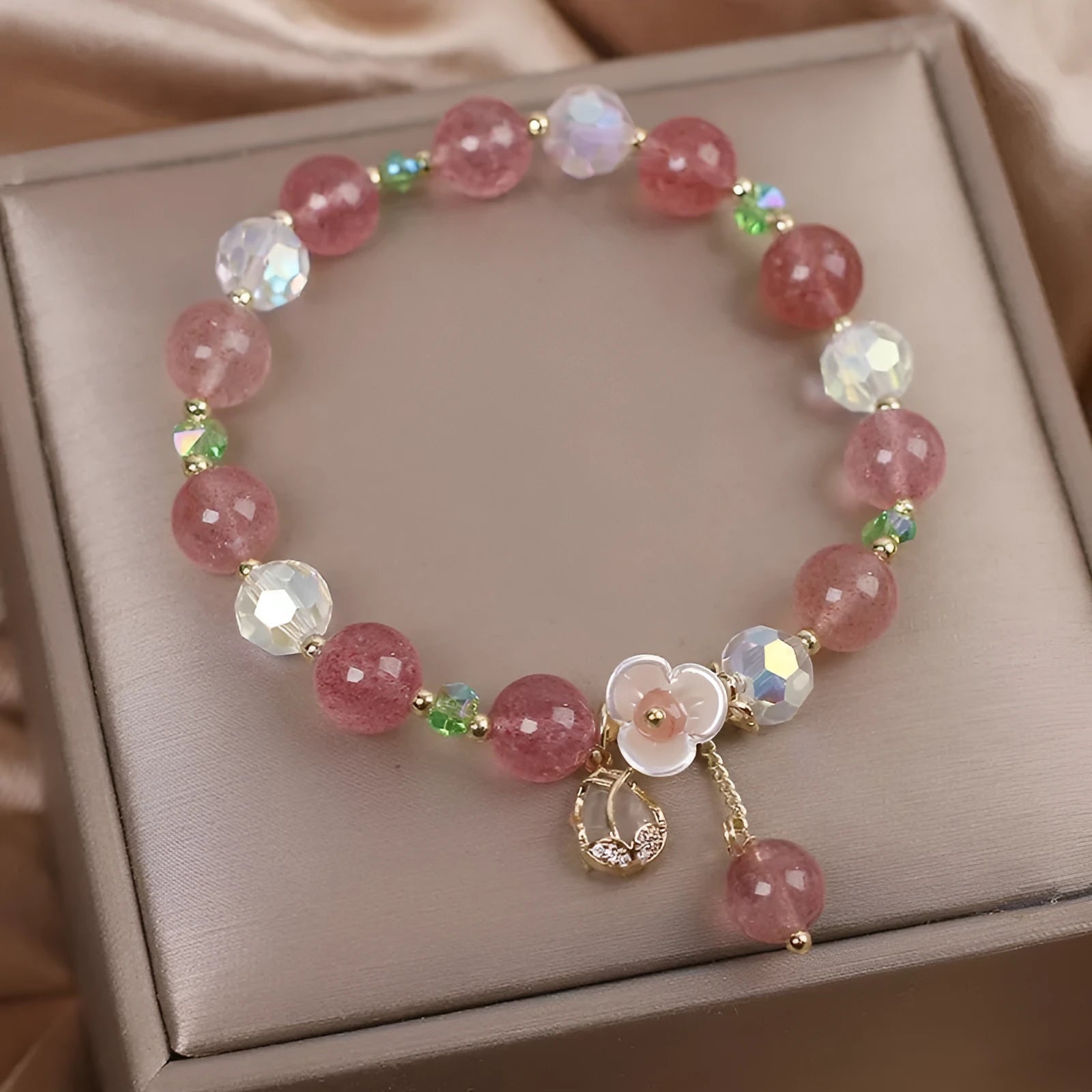 Red Cat's Eye Flower colour double-layer strawberry quartz crystal bracelet with lucky cat charm.