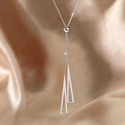 Adjustable sterling silver geometric triangle clavicle necklace for women with a modern design