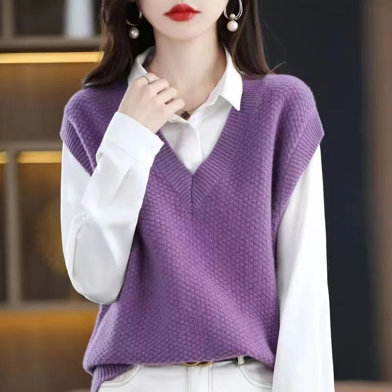 Creamy-white sleeveless V-neck knit vest with a raised 3D stereoscopic pattern on the front.