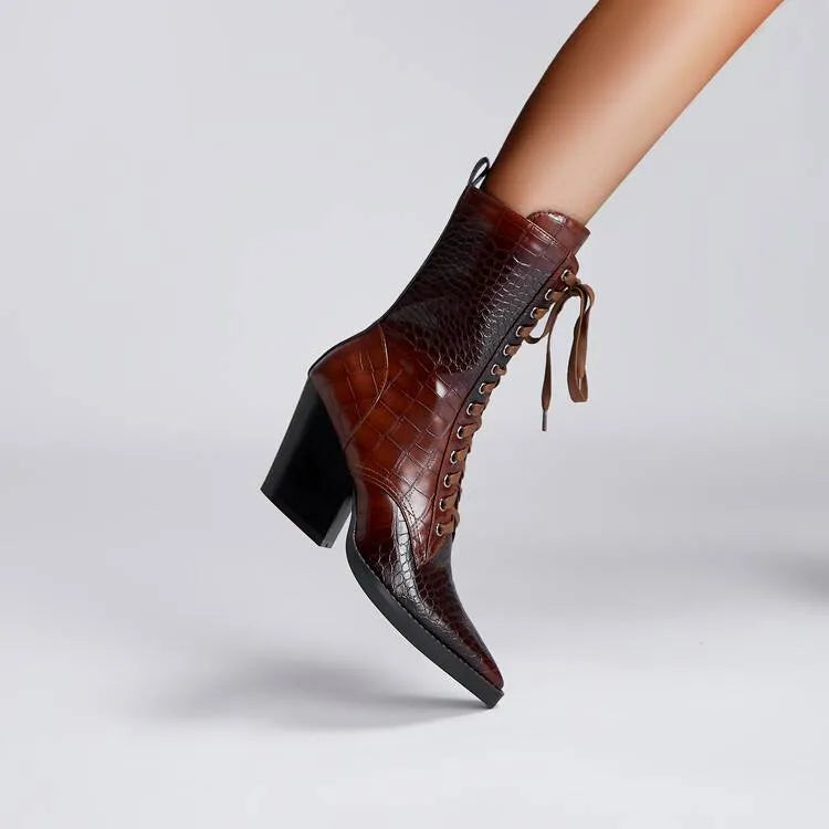 Dark brown women's lace-up ankle boots with a pointed toe and a chunky block heel.