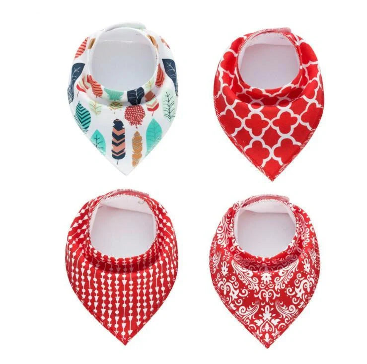 Set of four cotton baby bibs with arrow and wave designs for mess-free feeding