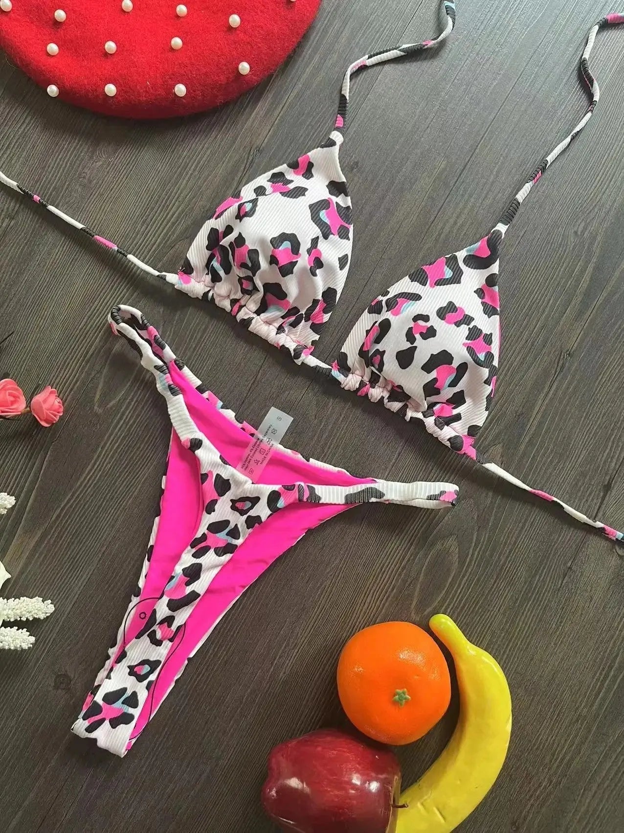 Women's printed two-piece bikini swimsuit with quick-dry fabric and cotton lining.