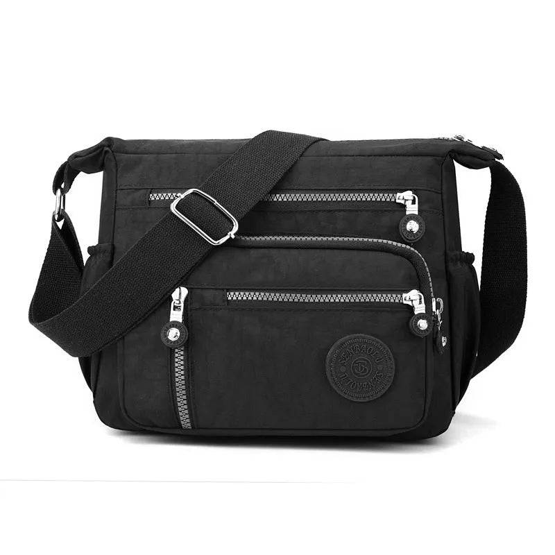 Soft nylon messenger bag in square vertical shape with adjustable shoulder strap