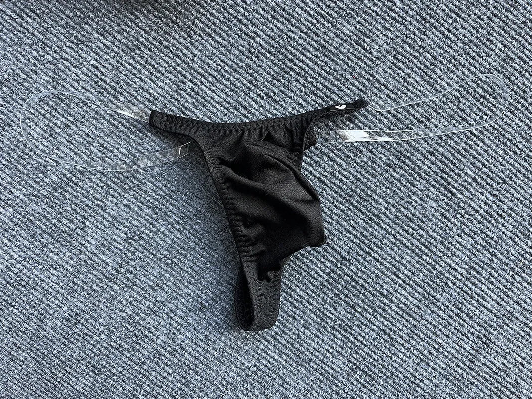 Invisible transparent belt low waist pouch underpants in nylon, T-back style, available in six colours and sizes M to XXL