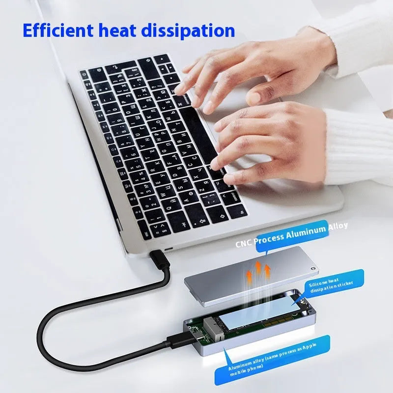 Silver aluminium M.2 SSD external enclosure with USB-C cable, screwdriver, screws, and silicone thermal pad on a desk
