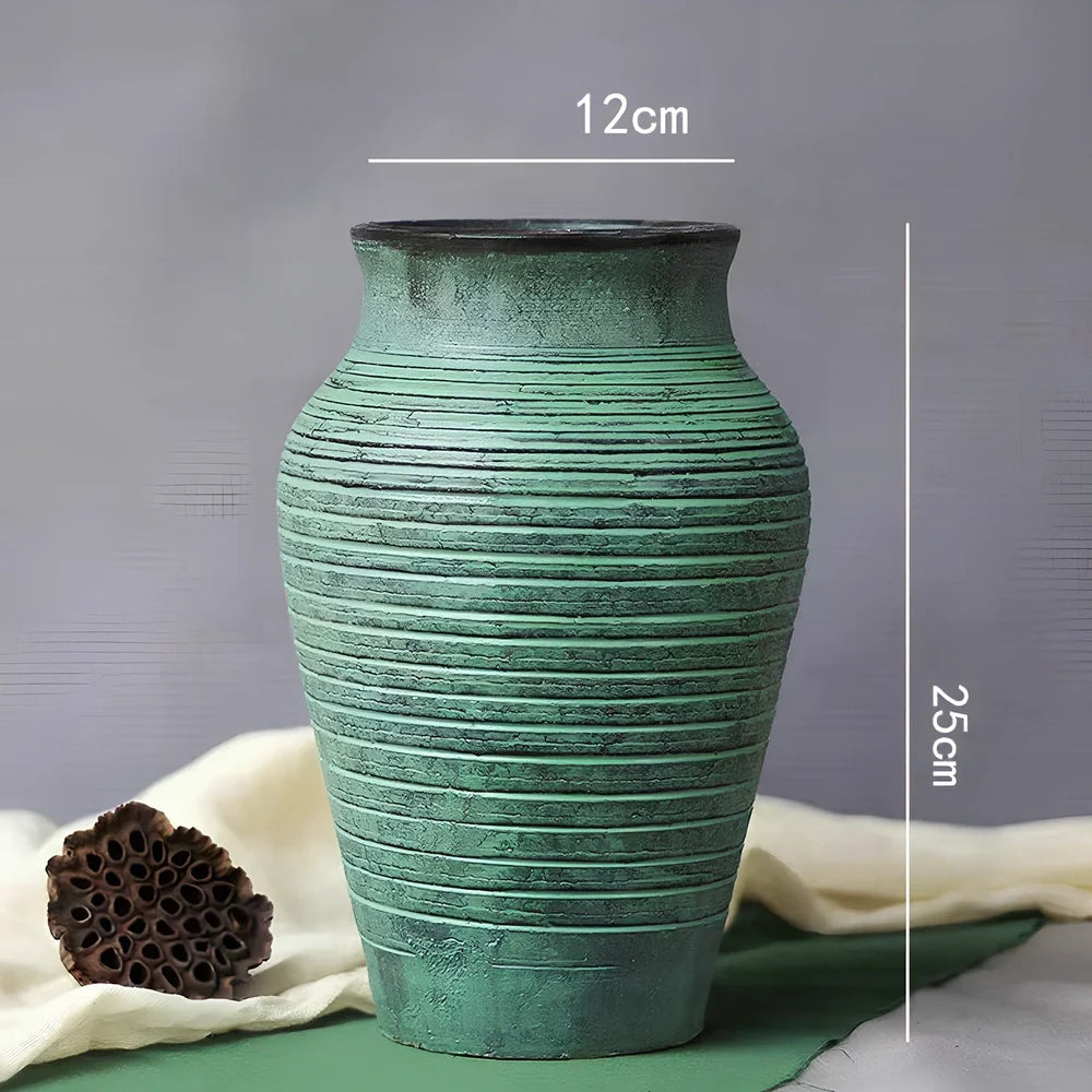 Ceramic mosaic vase with dried flower arrangement, handcrafted surface detailing