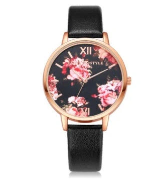 Elegant rose gold women's watch with leather strap and love heart design