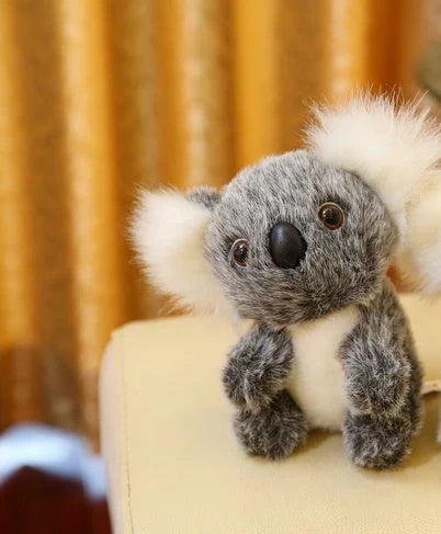 A soft, cuddly koala plush toy with short, premium plush fur and 100% pure cotton filling, showcasing the high-quality British craftsmanship.
