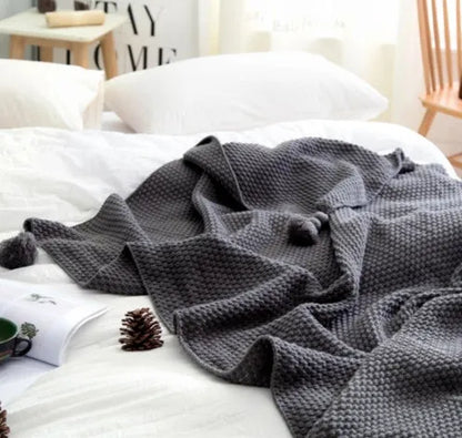 Nordic fringed knit ball acrylic blanket in beige colour measuring 130×170cm