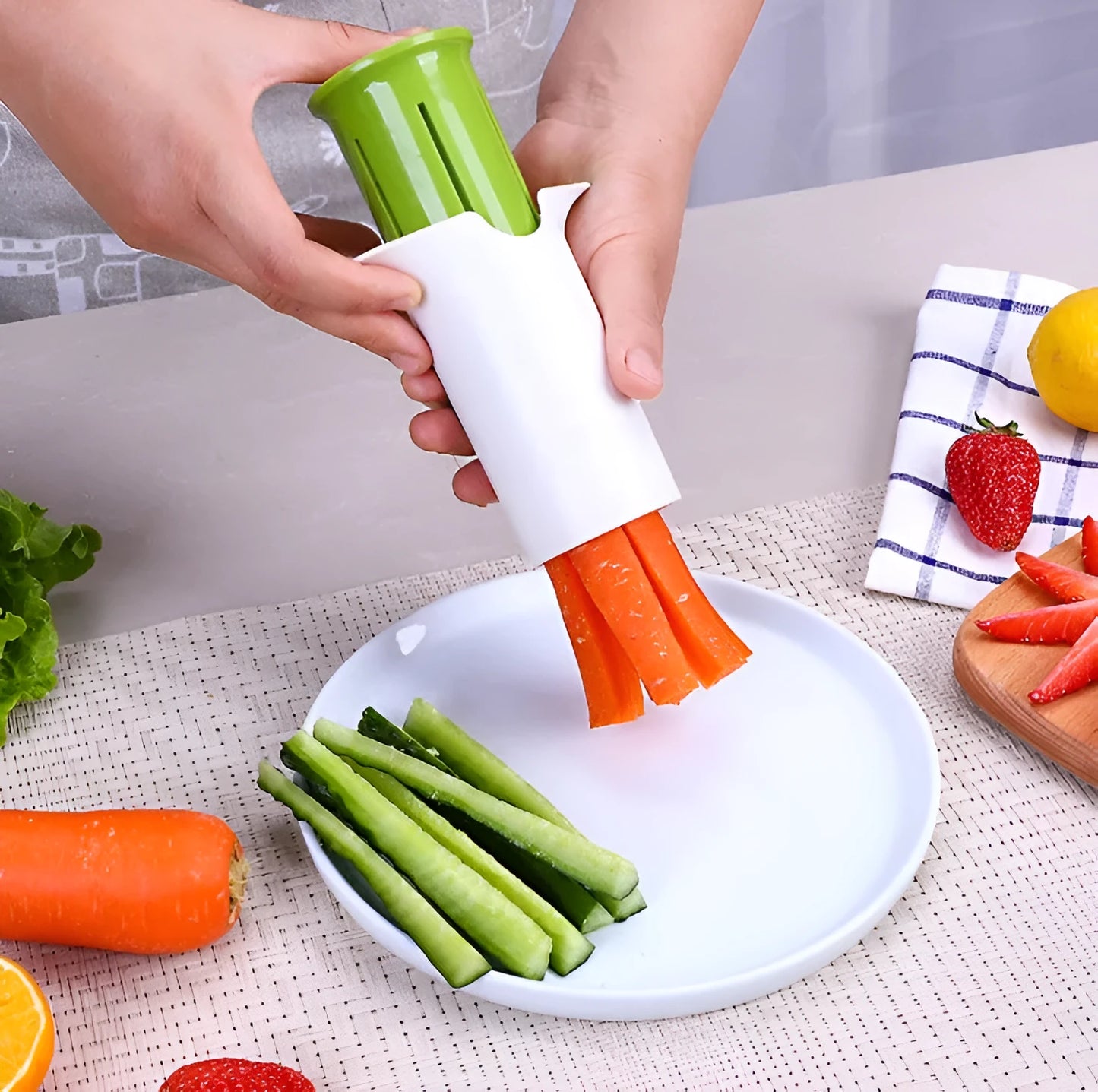 White ABS plastic kitchen slicer with six visible stainless steel blades for cutting cucumbers, carrots, and strawberries.