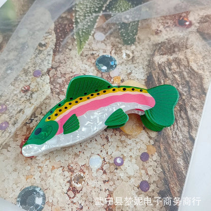Dark green PVC hair clip with detailed carp design measuring 8cm in length