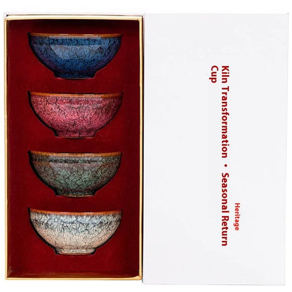 Set of four new Chinese style ceramic Kung Fu tea cups in a light-coloured gift box.