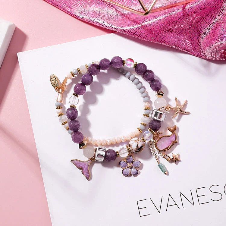 Whale tail bracelet with retro flower and starfish accents, a charming nautical accessory for UK fashionistas