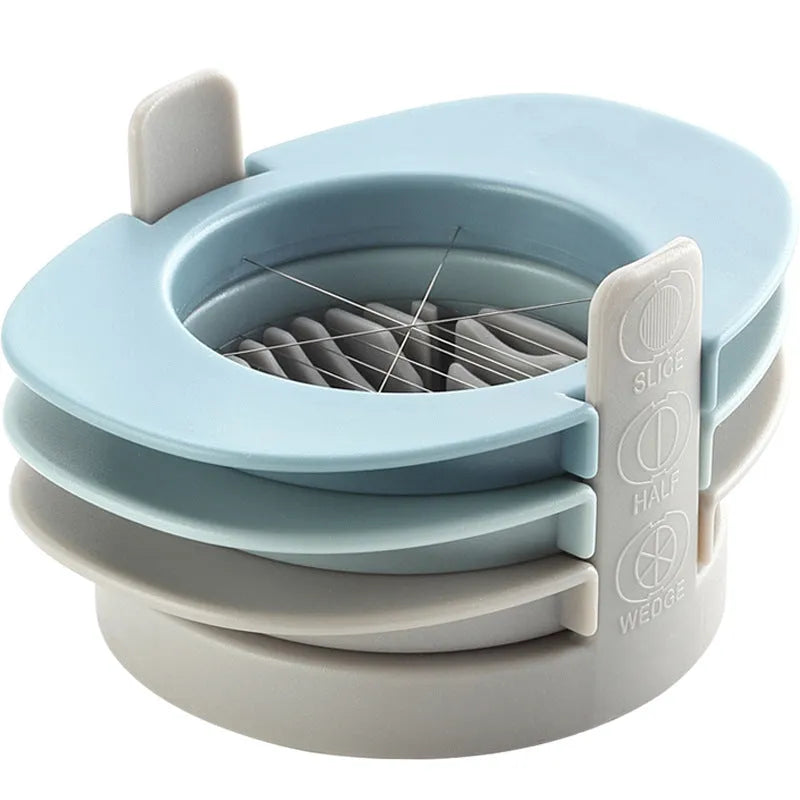 Three-function manual egg cutter in blue with stackable design for kitchen use
