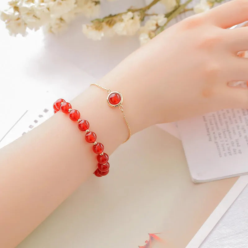 Double-layer women's bracelet with lucky beads and colourful crystals in gold-toned setting