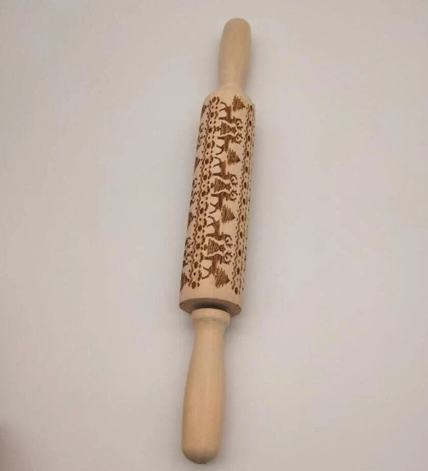 Festive rolling pin with embossed Christmas designs for easy imprinting on dough