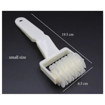 White plastic pizza knife set with three sizes for clean, effortless cuts