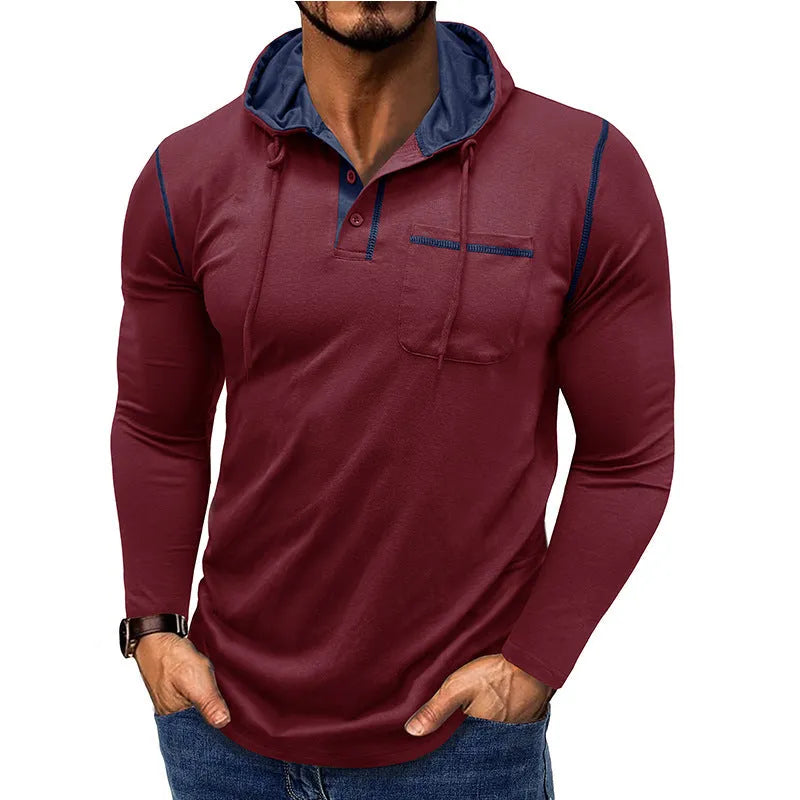 Man wearing a grey hooded henley long-sleeved t-shirt, showcasing the pullover style and cotton blend fabric.