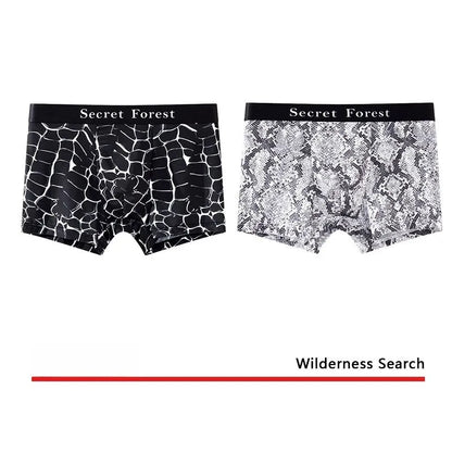Men's loose fit polyester boxer shorts in black colour showing mid-waist design
