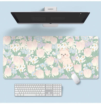 Large cartoon flower pattern mouse pad with non-slip rubber base on desk