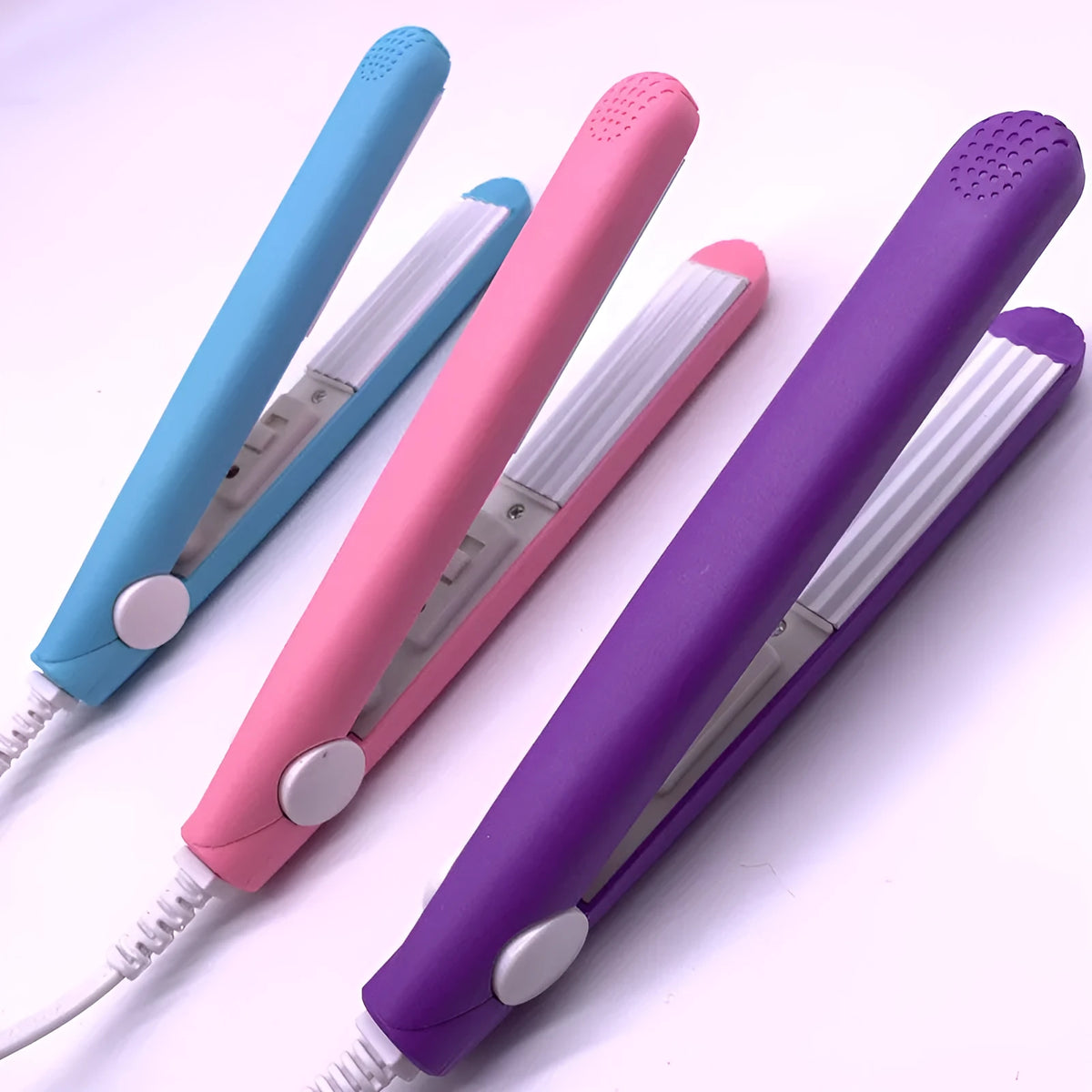 Mini splint hair straightener in pink, blue or purple, 17.5cm long, aluminium body, 180°C constant heat, 3D floating technology