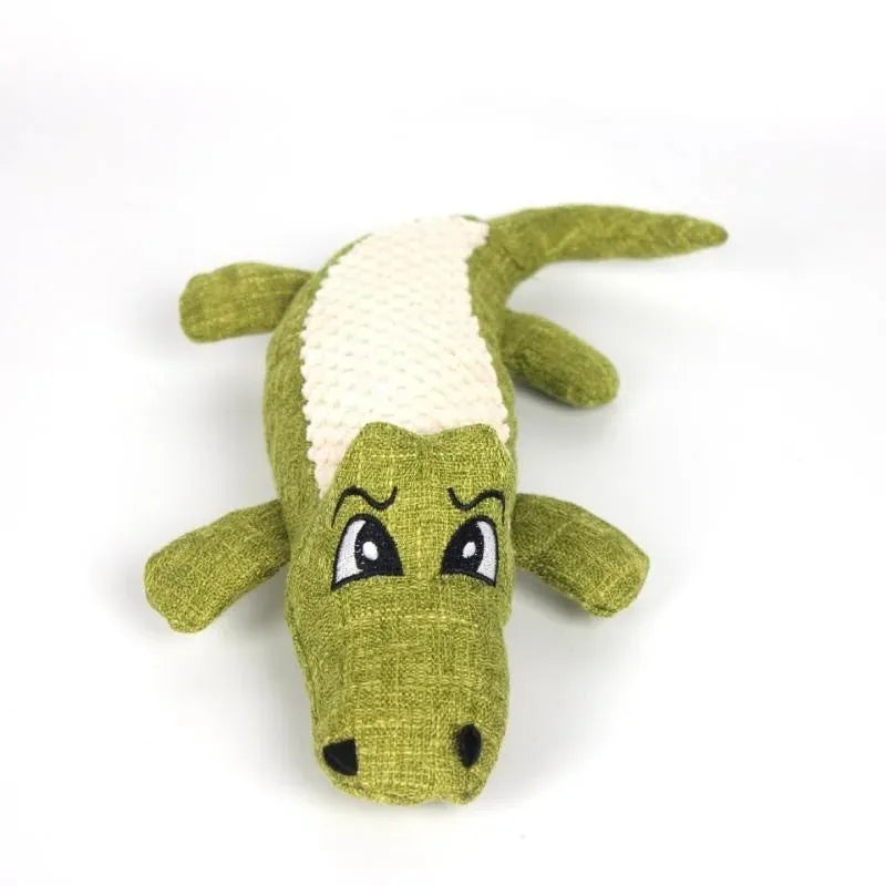 Blue corn grid plush toy for pets with biting sound function next to green and red versions.