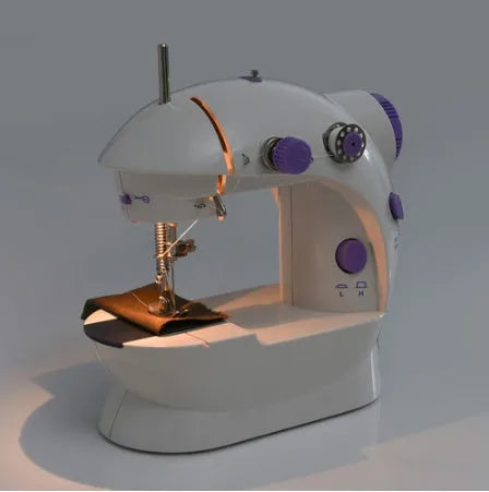 Compact white mini electric household sewing machine with work light and thread cutter.