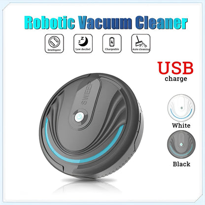 Black automatic sweeping robot vacuum cleaner with remote control on a wooden floor.