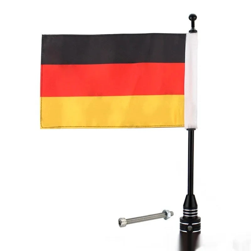 Motorcycle tail box flagpole for mounting on luggage carrier, in black or silver finish.